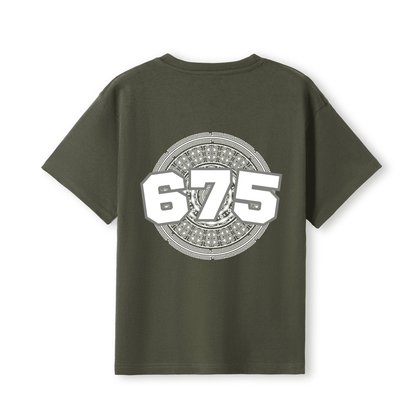 An olive green short-sleeve t-shirt shown from the back, featuring a large white and grey graphic print of the number '675'