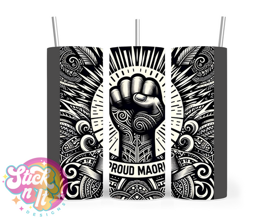 Stainless steel tumbler featuring a raised fist and quote Proud Māori on a grey background