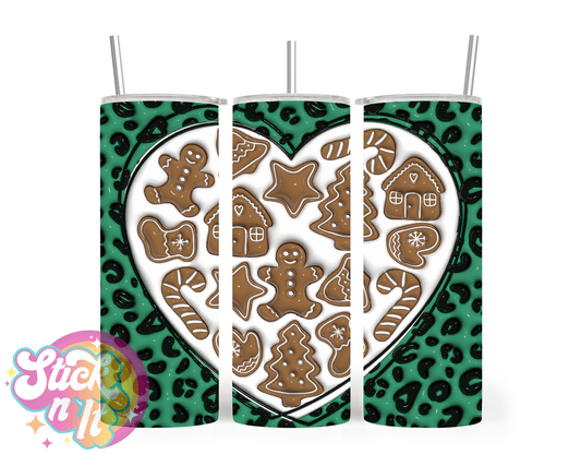 Stainless steel insulated tumbler featuring green heart tin with Christmas cookies