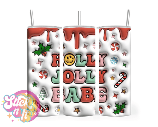 Stainless steel insulated tumbler featuring quote Holly Jolly babe