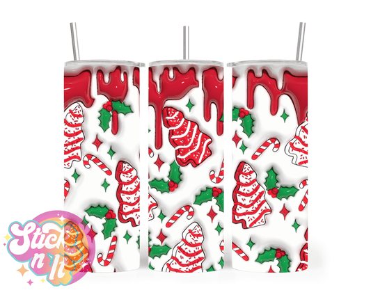 Stainless steel insulated tumbler featuring Christmas trees and candy canes 