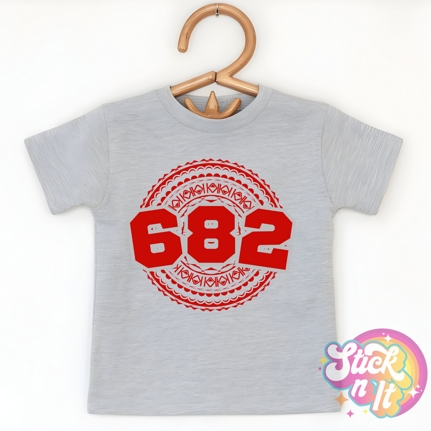 Kids size grey shirt featuring a Polynesian Cook Islands design with area code 682 in red.