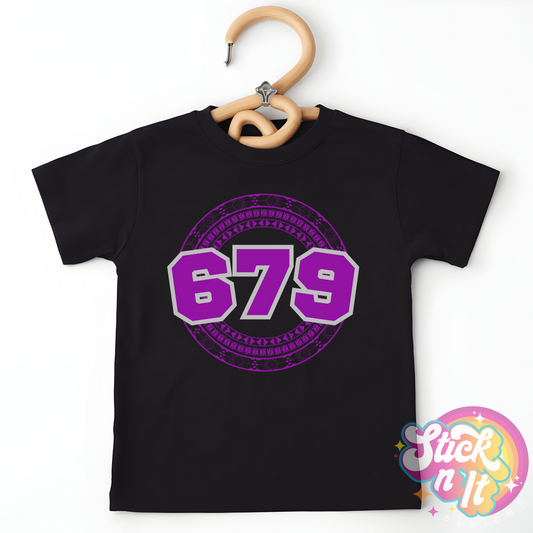 Kids size black shirt featuring a Pacific Islands Fiji design with area code 679 in purple.