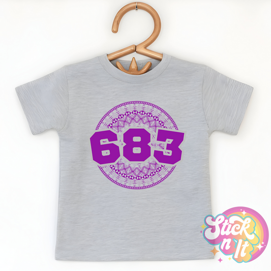 Kids size grey shirt featuring a Polynesian Niue design with area code 683 in purple.