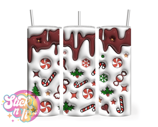 Stainless steel insulated tumbler featuring Christmas candy and candy canes