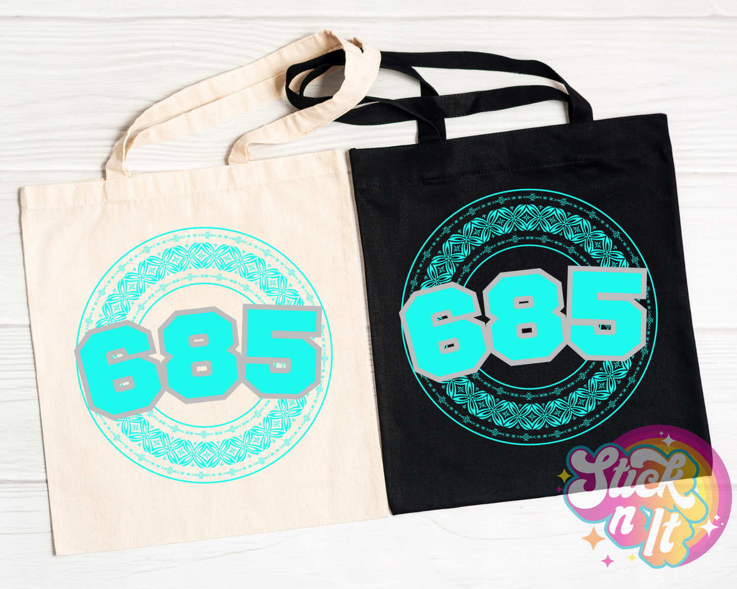 Black and natural coloured tote bags featuring a Polynesian Samoa design and area code 685 in aqua.