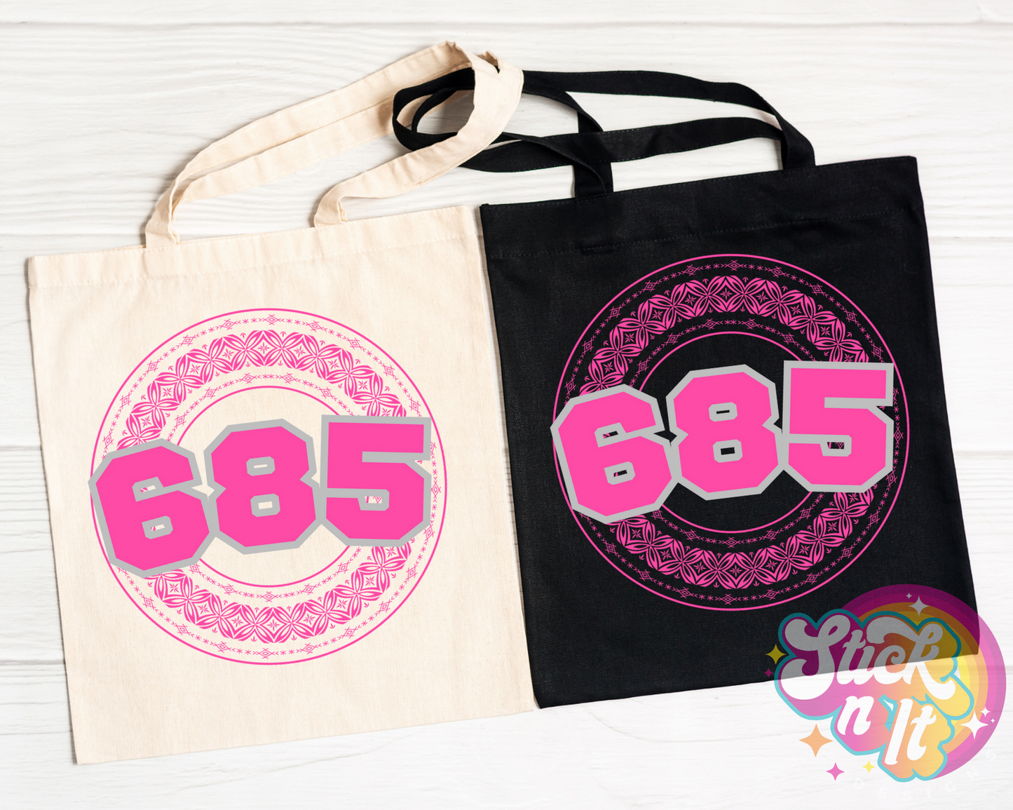 Black and natural coloured tote bags featuring a Polynesian Samoa design and area code 685 in pink.