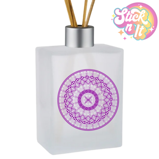 Rectangle glass reed diffuser with reed sticks featuring a Polynesian Niue design in purple.