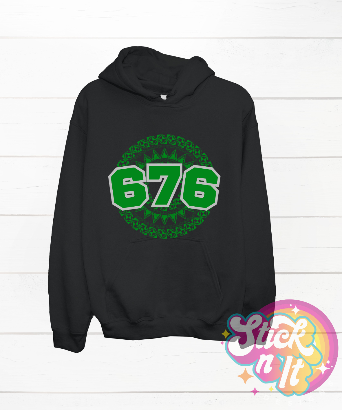 Unisex black hoodie featuring a Polynesian Tonga design with area code 676 in green