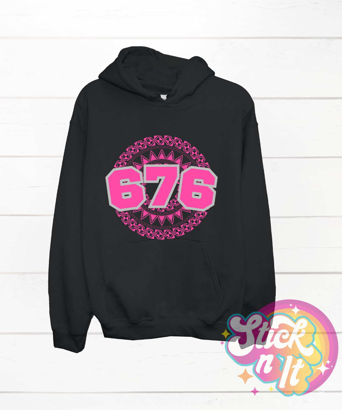 Unisex black hoodie featuring a Polynesian Tonga design with area code 676 in pink