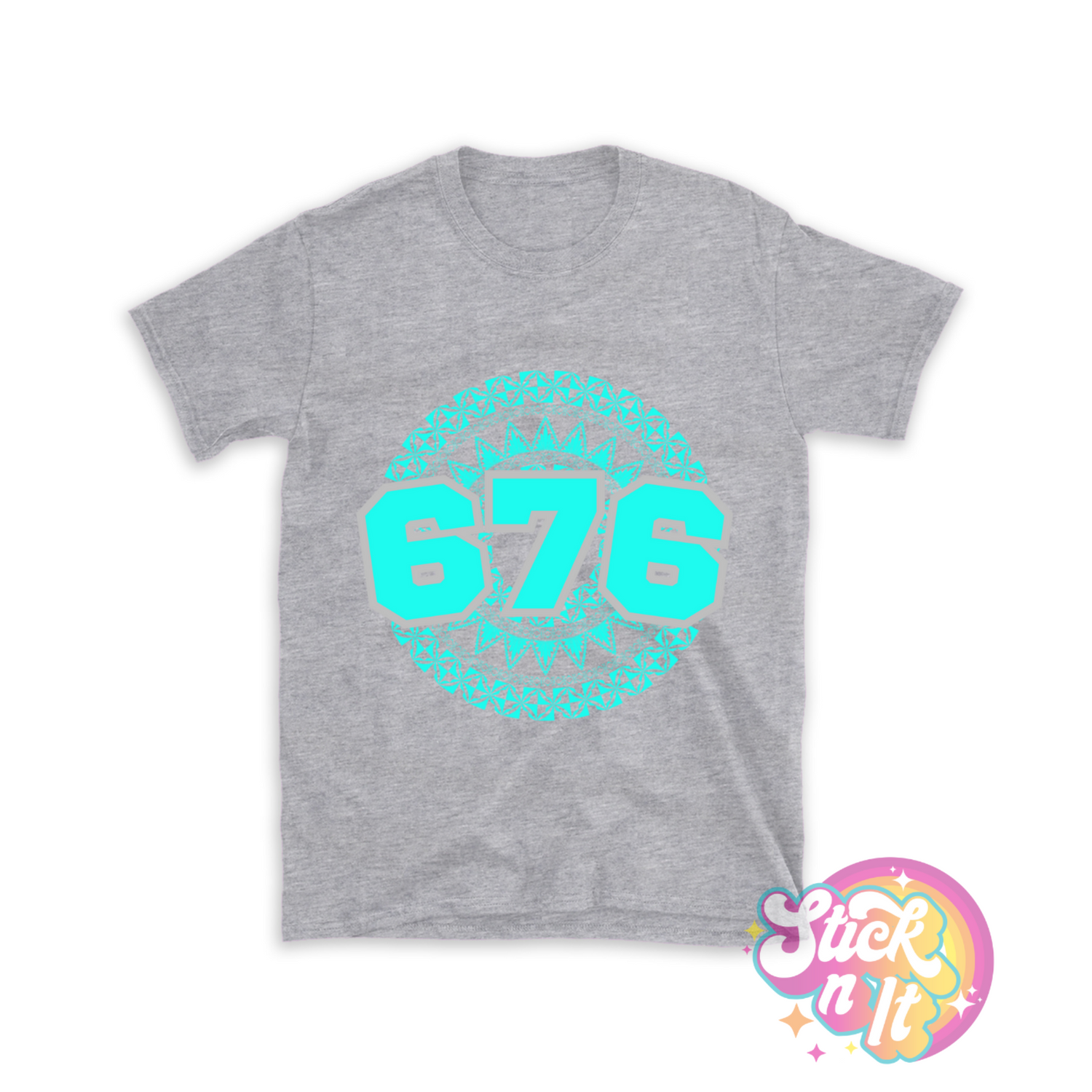 Unisex grey shirt featuring a Polynesian Tonga design with area code 676 in aqua