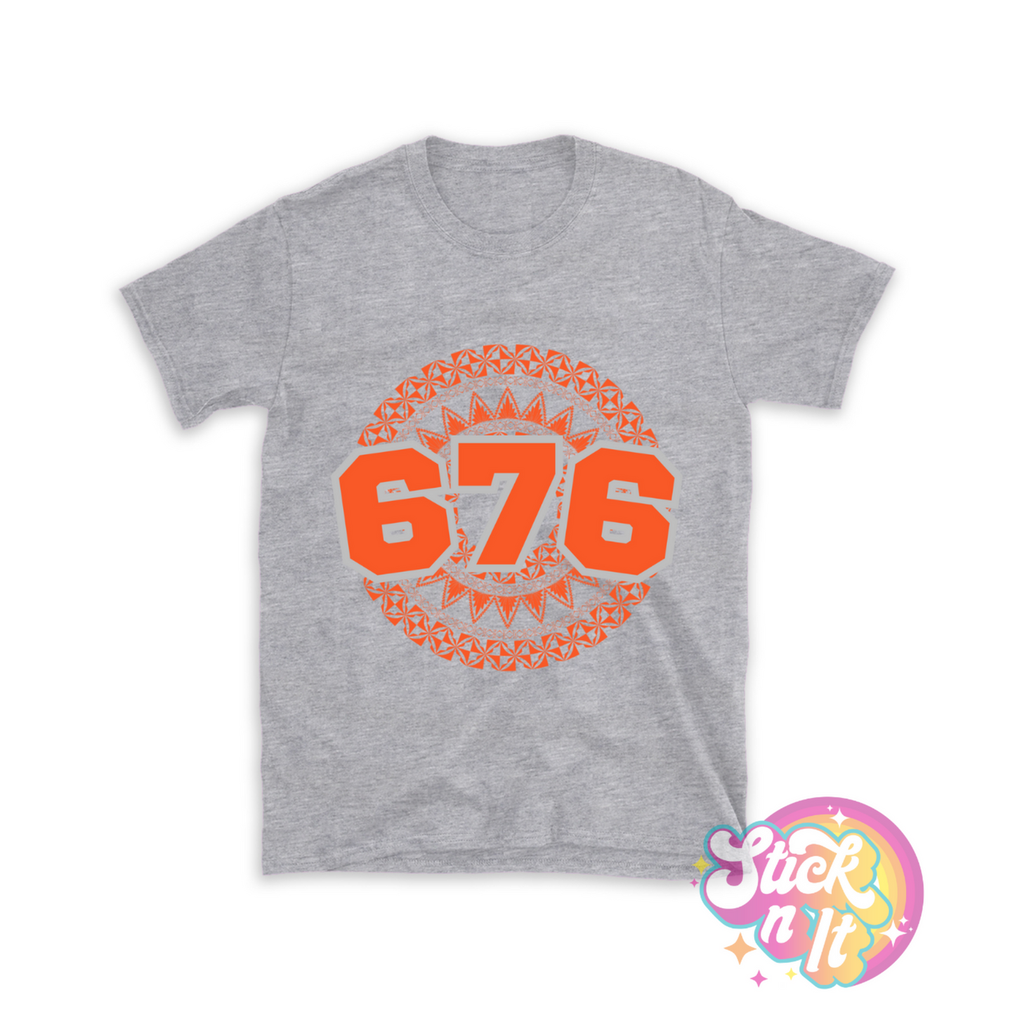 Unisex grey shirt featuring a Polynesian Tonga design with area code 676 in orange