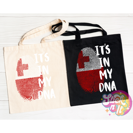 Tote bags featuring quote It's in my DNA and fingerprint shaped Tonga flag